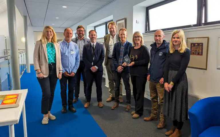 Council officers, iESE members and Ouse and Adur Rivers Trust celebrate the award in the Shoreham Centre