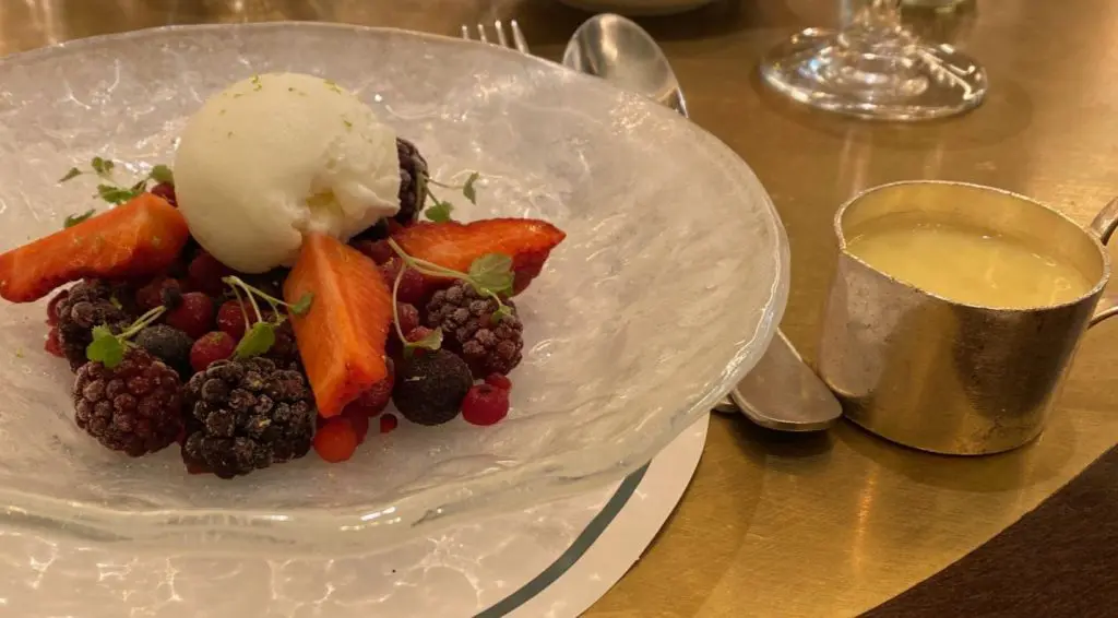 Frozen berries with warm white chocolate sauce