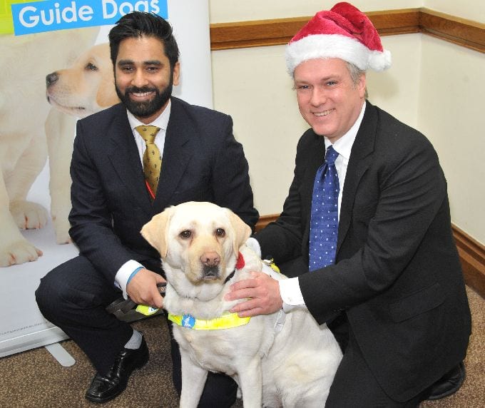 Henry Smith MP with Amit and guide dog Kika