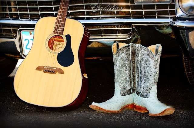 Country music guitar and cowboy boots
